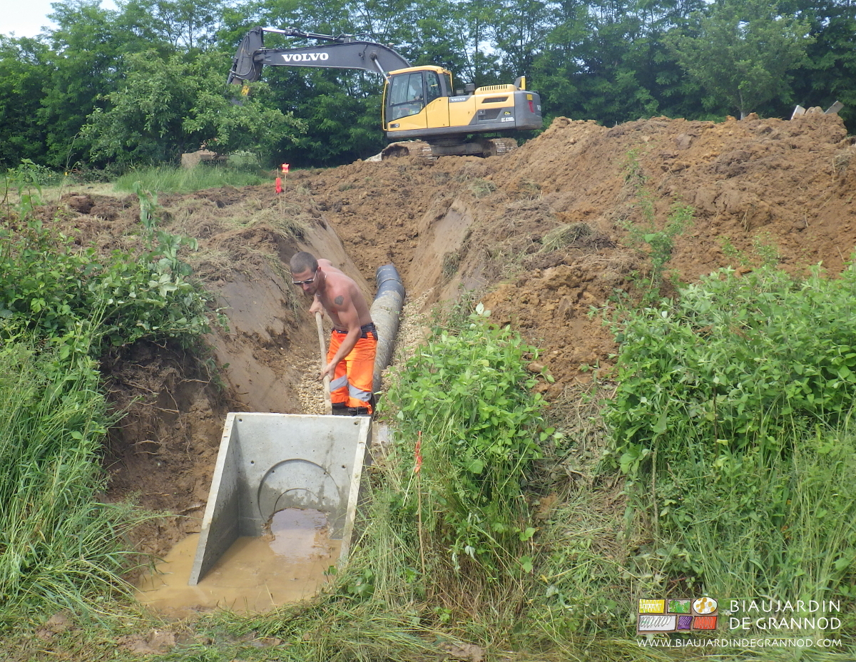photo de pose de la bouche d'évacuation lors du drainage