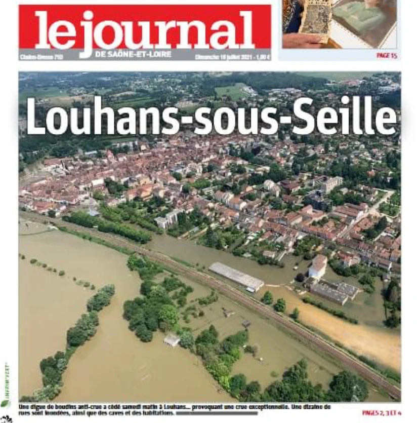 scan du journal de Saône et Loire titrant Louhans sous Seille avec photo aérienne